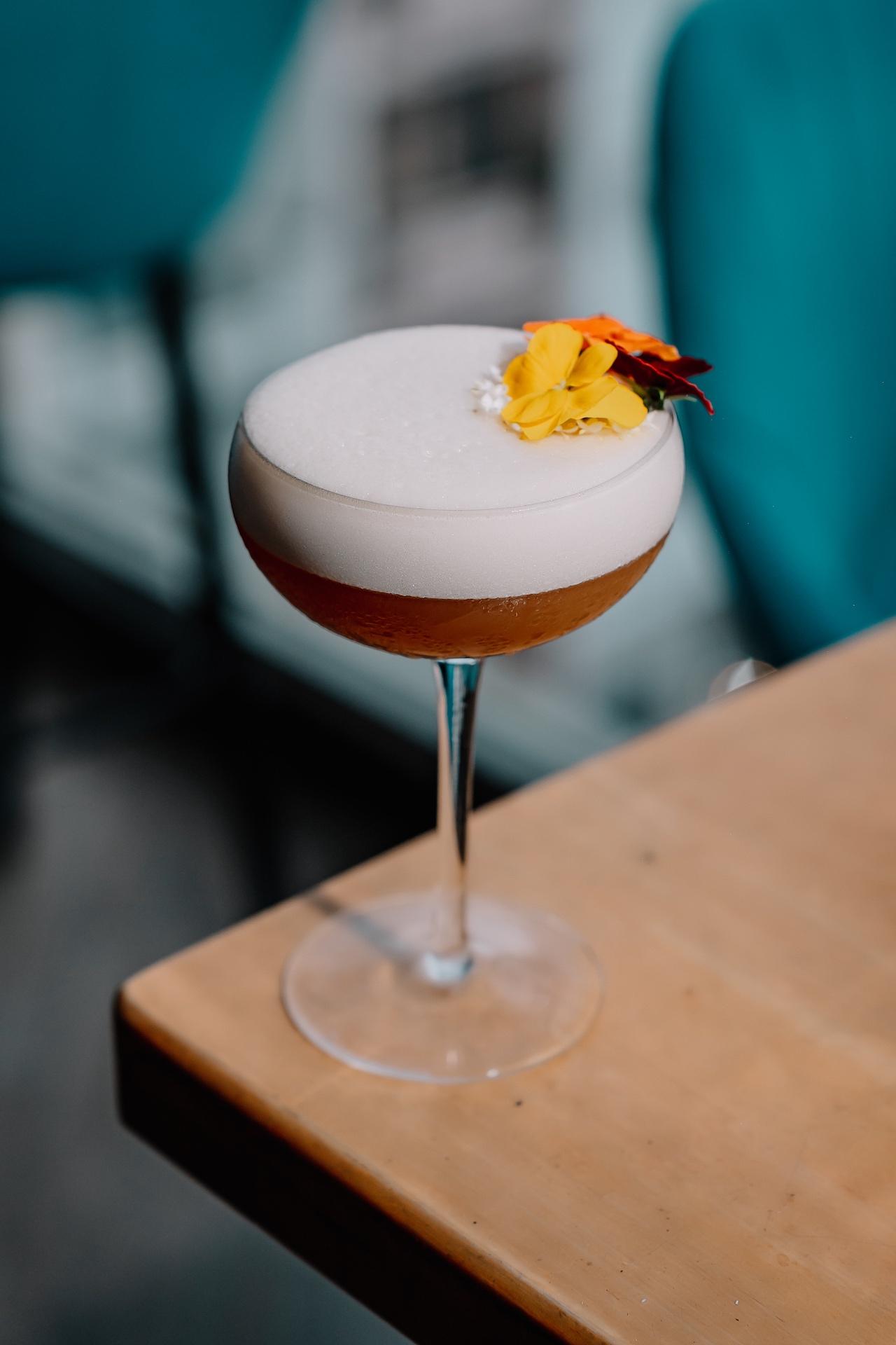 Saigon Sour cocktail with Irish whiskey, elderflower and yuzu at Momento Rooftop in Ho Chi Minh City